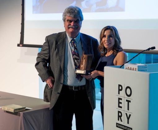 Chicago-based Author and Journalist Maria A. Karamitsos presents an award to Harry Mark Petrakis’ son, John, as the late author is inducted into the Chicago Literary Hall of Fame. PHOTO BY DON SEELEY