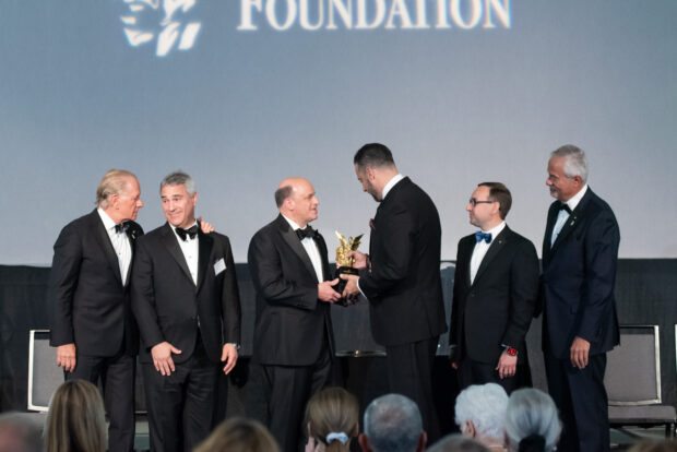 Paradigm Recipient, Tim Tassopoulos, (Retired President and Chief Operating Officer of Chick-fil-A) receives his award; PHOTO: ELIOS PHOTOGRAPHY