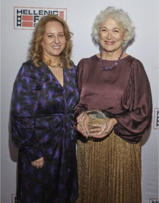 Hellenic Film Society president Maria C. Miles presents the HFS Lifetime Achievement Award to award-winning actress Vangelio Andreadaki; PHOTO: ANASTASSIOS MENTIS