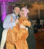 Hellenic Medical Society President Dr. George Liakeas in costume with a friend, PHOTO: ETA PRESS